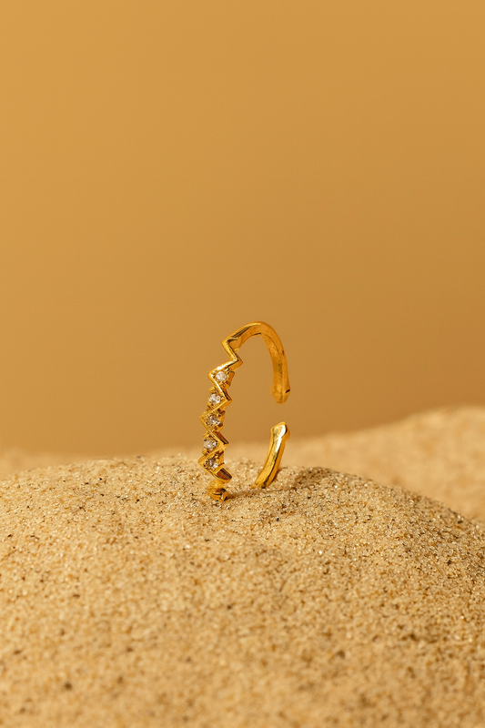 Jewello shimmering zig-zag gold plated with a studded American diamond Adjustable finger ring for women and girls.
