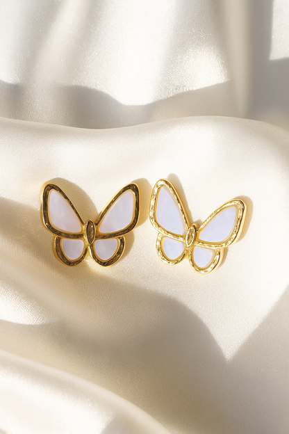 Jewello alluring gold plated butterfly design with light pink stone stud anti Korean earring for women and girls.