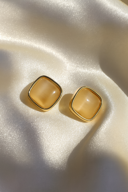 Jewello fancy gold plated square design and light pink stone stud anti tarnish Korean earring for women and girls.