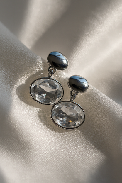 Jewello fancy silver plated oval shape design white shimmering stone stud Korean earring for women and girls.