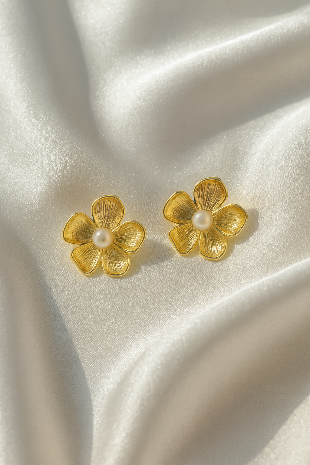 Jewello stylish gold-plated floral design with white pearl stud dainty Korean earring for women and girls.