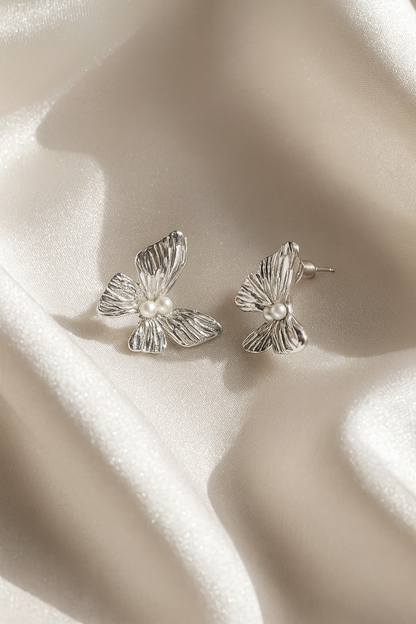 Jewello charming silver-plated butter fly design and pearl bead stud Korean earring for women and girls.