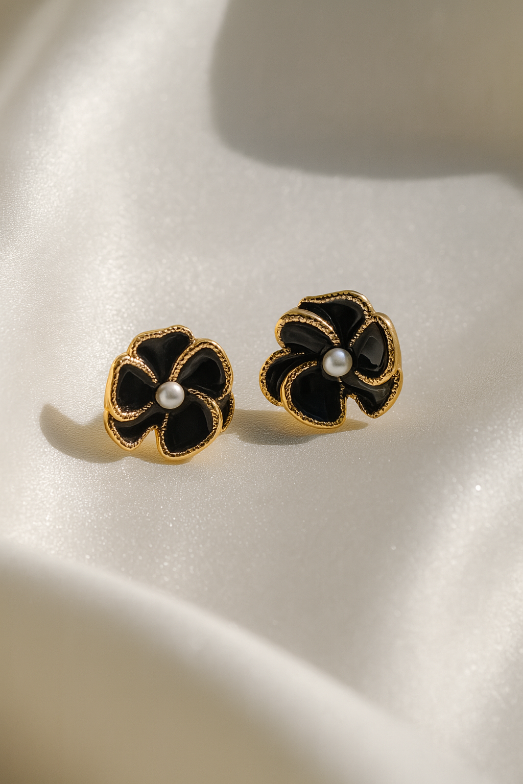 Jewello fancy gold plated flower design with black stone and white pearl stud dainty Korean earring for women and girls.