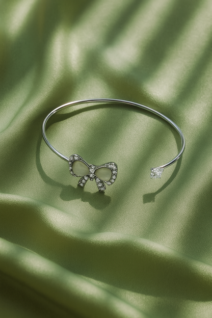 Jewello trendy silver plated with shimmering white stone stud cuff bracelet, Kada bracelet, Kada bracelet for women and girls.