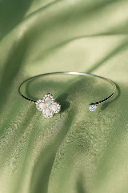 Jewello fashionable silver-plated flora design with shimmering white stone stud cuff bracelet, Kada bracelet for women and girls.