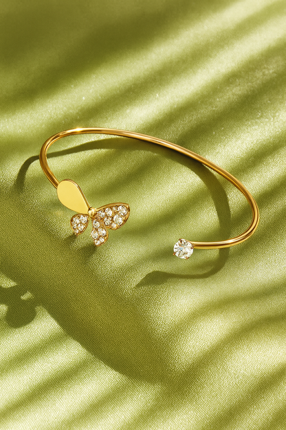 Jewello trendy gold-plated butterfly design with shimmering white stone stud cuff bracelet, Kada bracelet for women and girls.
