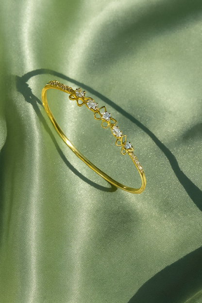 Jewello delicate gold plated with shimmering white stone stud cuff bracelet, Kada bracelet for women and girls.