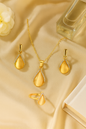 Jewello delicate gold-plated drop shape design with white stone stud chain pendant set for women and girls.