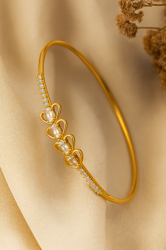 Jewello delicate gold plated with shimmering white stone stud Adjustable Kada bracelet for women and girls.