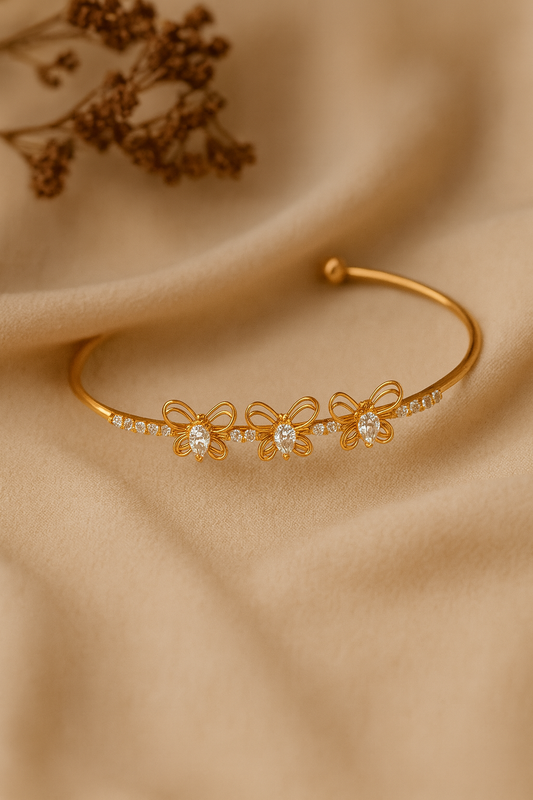 Jewello fancy gold-plated butterfly design with shimmering white stone stud Adjustable cuff bracelet, Kada bracelet for women and girls.