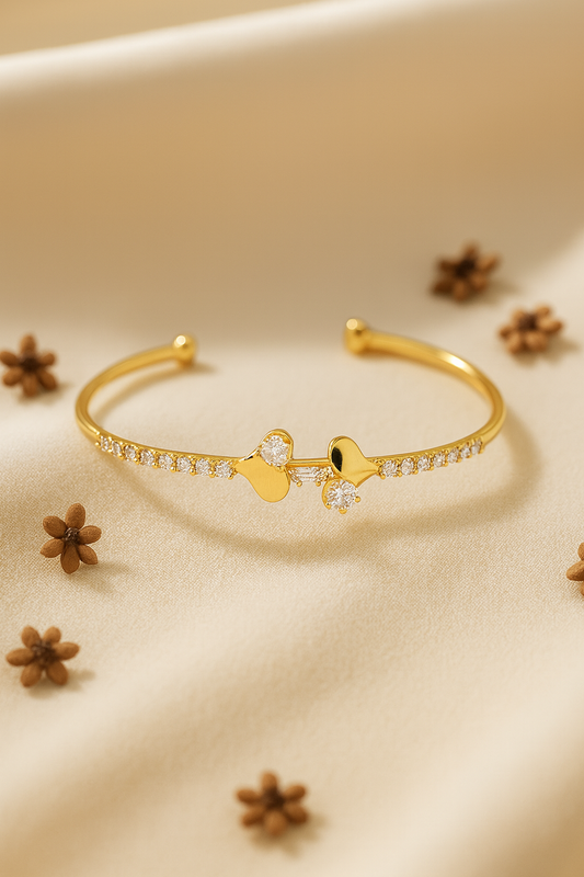Jewello Adorable gold-plated heart design with cubic zirconia stud cuff bracelet, Kada bracelet for women and girls.