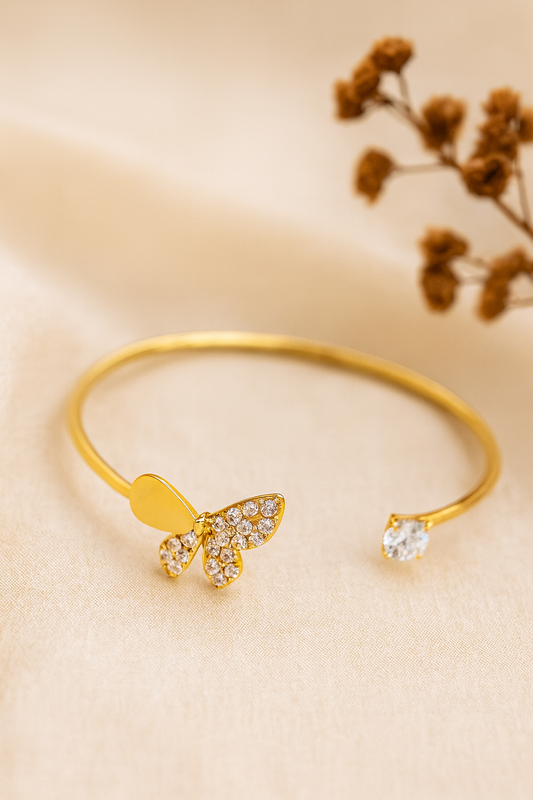 Jewello trendy gold-plated butterfly design with shimmering white stone stud cuff bracelet, Kada bracelet for women and girls.
