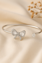 Jewello trendy silver plated with shimmering white stone stud cuff bracelet, Kada bracelet, Kada bracelet for women and girls.