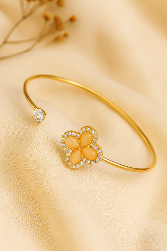 Jewello fashionable gold-plated floral design with golden stone stud cuff bracelet, Kada bracelet for women and girls.
