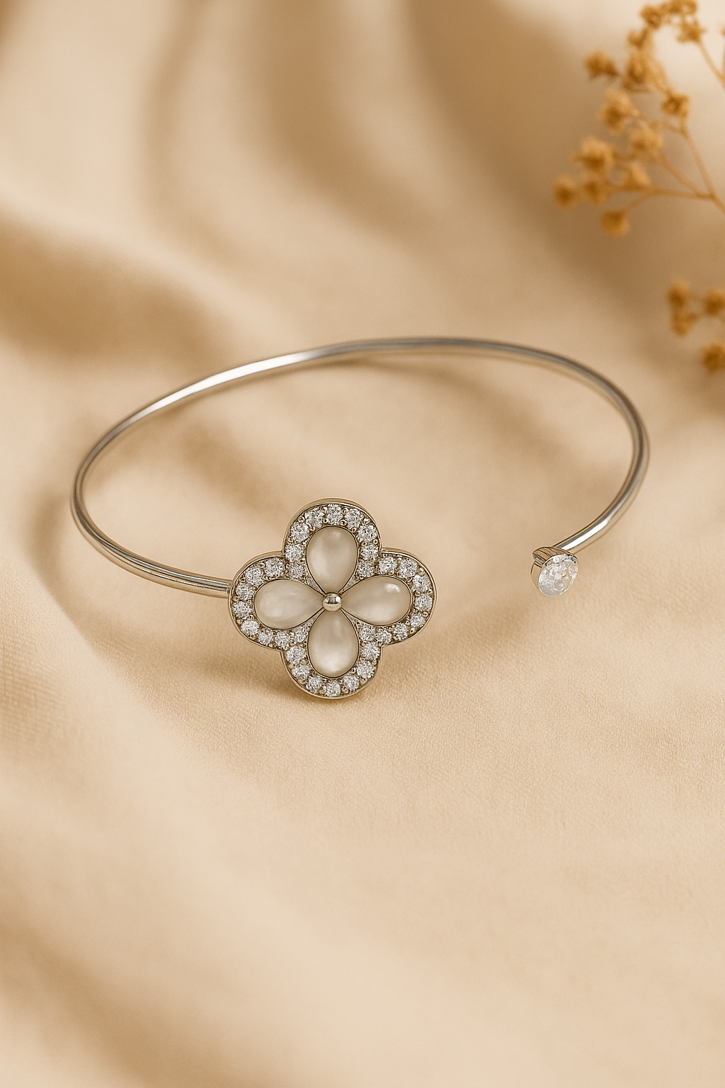 Jewello fashionable silver-plated flora design with shimmering white stone stud cuff bracelet, Kada bracelet for women and girls.