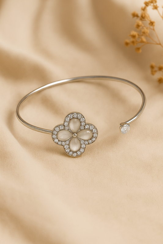 Jewello fashionable silver-plated flora design with shimmering white stone stud cuff bracelet, Kada bracelet for women and girls.