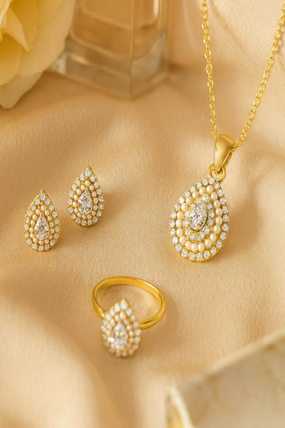 Jewello Adorable gold-plated drop shape with shimmering stone and pearl stud chain pendant, earring and finger ring set for women and girls.