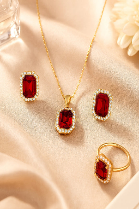 Jewello's delicate gold-plated red colour cubic zirconia stud chain pendant, earring and finger ring set for women and girls.