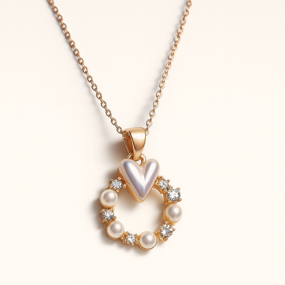 Jewello delicate gold-plated round shape design with heart shape pearl and stone stud chain pendant set for women and girls.