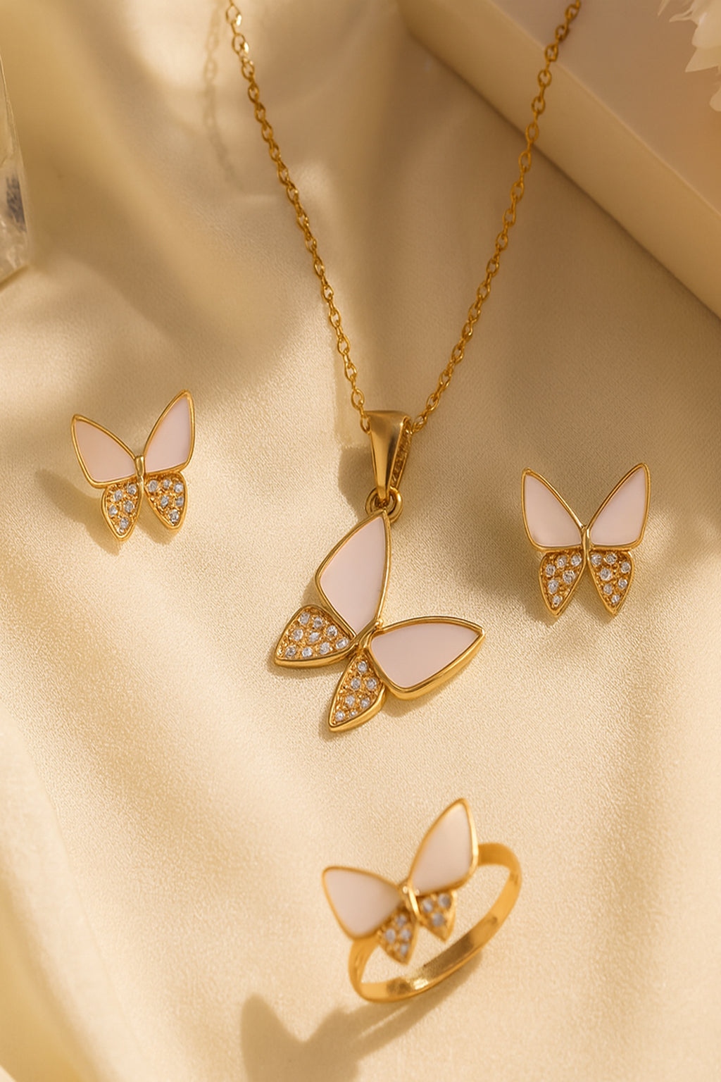 Jewello gorgeous gold-plated butterfly design with pink and shimmering white stone stud chain pendant, set for women and girls.