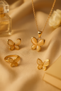 Jewello elegant rose gold-plated floral design with pink stone stud chain pendant set for women and girls.