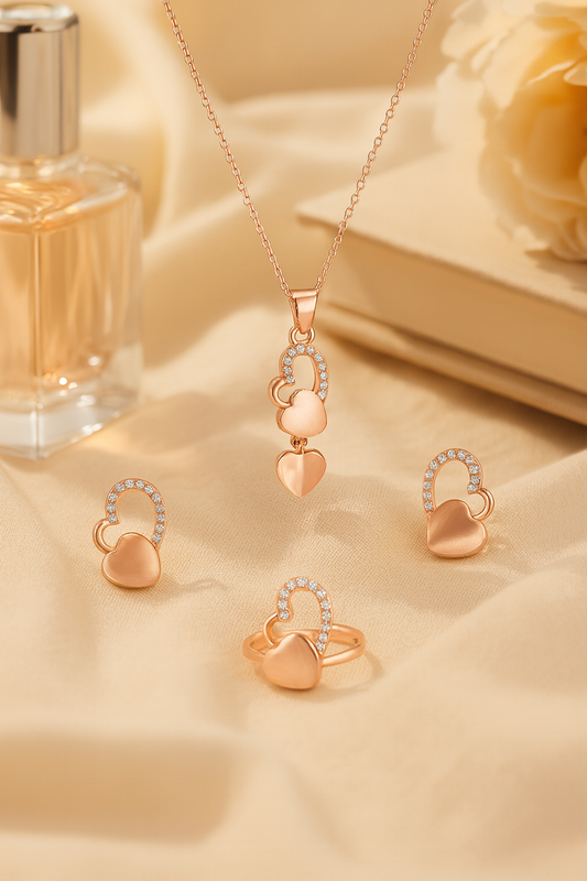 Jewello elegant rose gold-plated heart design with light white stone with American diamond stud chain pendant set for women and girls.