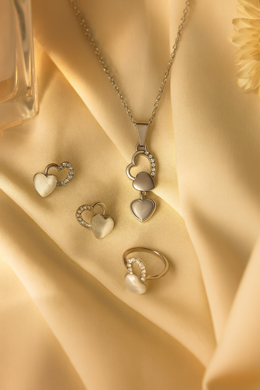 Jewello trendy silver-plated heart design with white stone stud chain pendant set for women and girls.