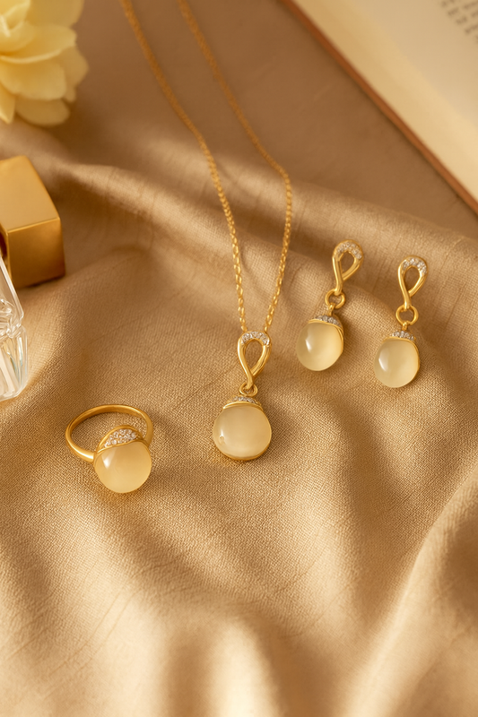 Jewello elegant gold plated with white stone stud earring, finger ring, chain pendant set for women and girls.