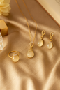 Jewello elegant gold plated with white stone stud earring, finger ring, chain pendant set for women and girls.