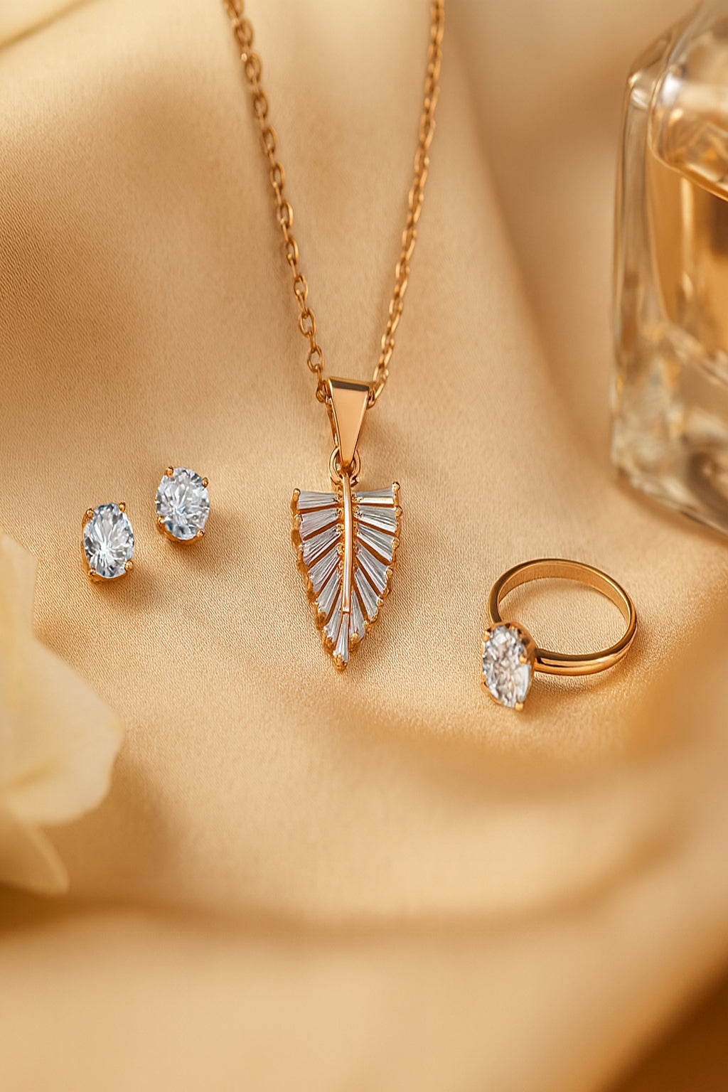 Jewello fancy rose gold plated with shimmering white stone stud pendant chain set for women and girls.