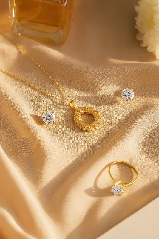 Jewello trendy gold plated with shimmering American diamond stud pendant chain set for women and girls.