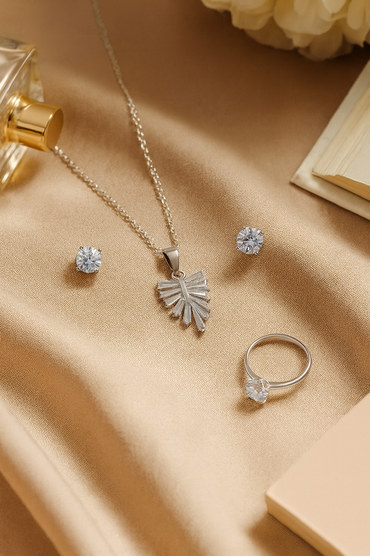 Jewello fancy silver plated leaf design with shimmering white stone stud pendant chain set for women and girls.