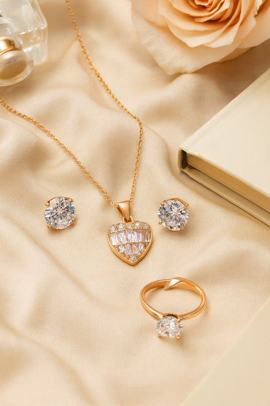 Jewello stylish rose gold-plated heart design with shimmering white stone stud pendant chain set for women and girls.