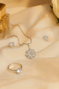 Jewello stylish silver-plated floral design with shimmering stone stud pendant chain set for women and girls.