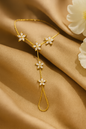 Jewello fashionable gold-plated floral design with shimmering white stone stud hath Phool, Panja, Adjustable hand chain bracelet for women and girls.