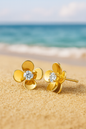 Jewello golden flower shimmering stone stud Korian earring for women and girls.
