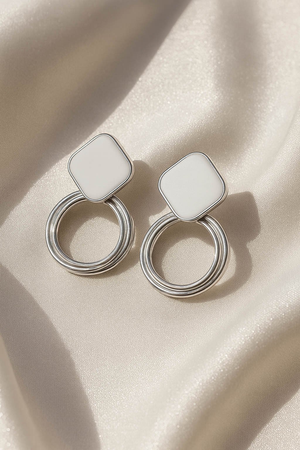 Jewello sterling and fancy silver finish round ring shape Korean earring for women and girls.