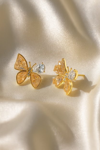 Jewello fashionable gold-plated butterfly design and studded orange stone anti tarnish Korean earring for women and girls.