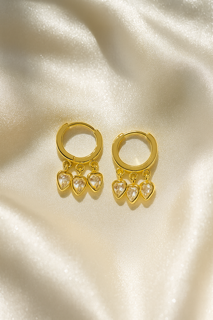 Jewello stylish gold plated with hanging charming heart design stone anti tarnish Korean earring for women and girls.