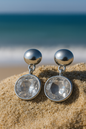 Jewello fancy silver plated oval shape design white shimmering stone stud Korean earring for women and girls.