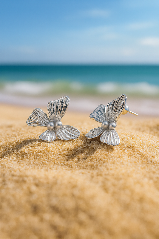 Jewello charming silver-plated butter fly design and pearl bead stud Korean earring for women and girls.