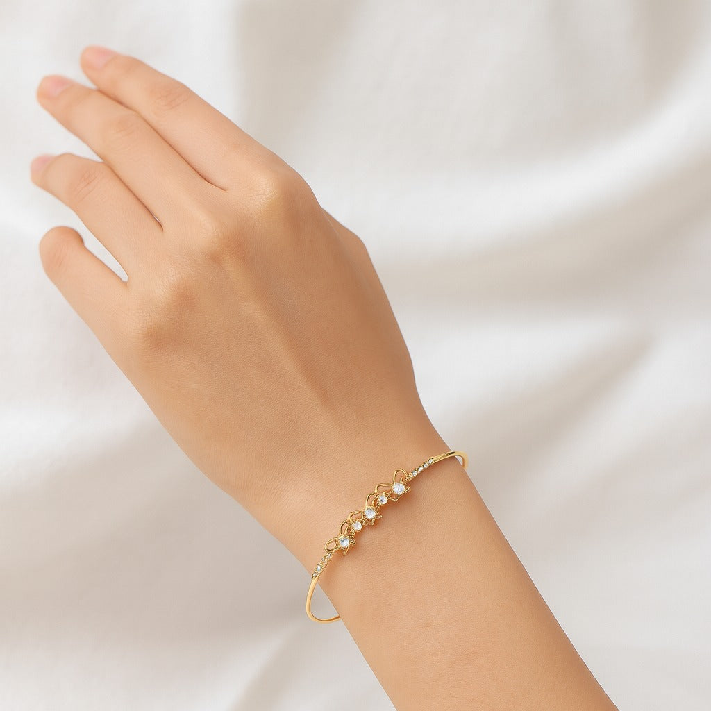 Jewello fancy gold-plated butterfly design with shimmering white stone stud Adjustable cuff bracelet, Kada bracelet for women and girls.