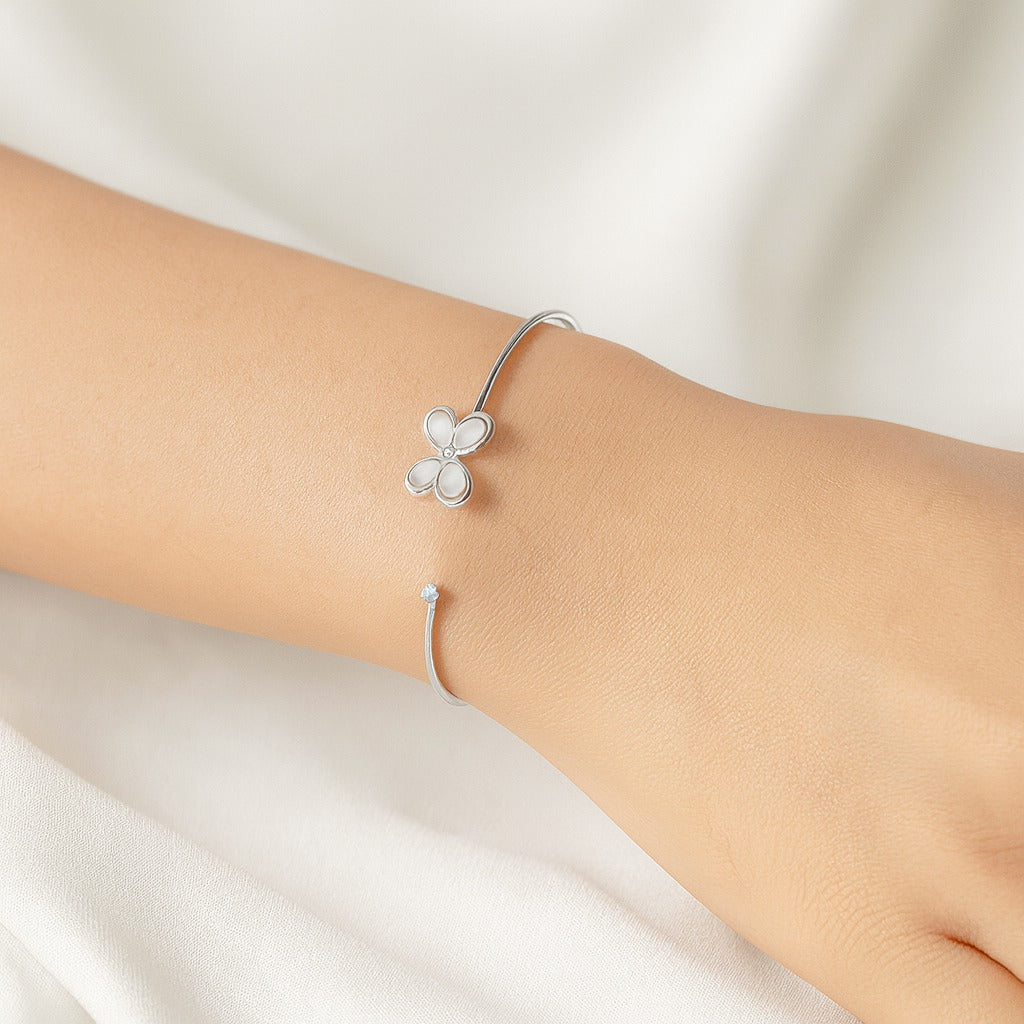 Jewello elegant silver-plated floral design with shimmering white stone stud cuff bracelet, Kada bracelet for women and girls.