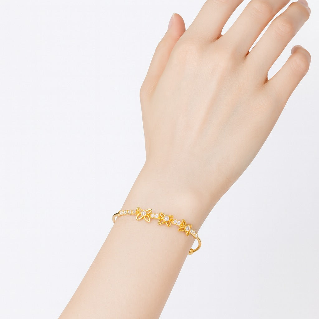 Jewello delicate gold plated with shimmering white stone stud cuff bracelet, Kada bracelet for women and girls.