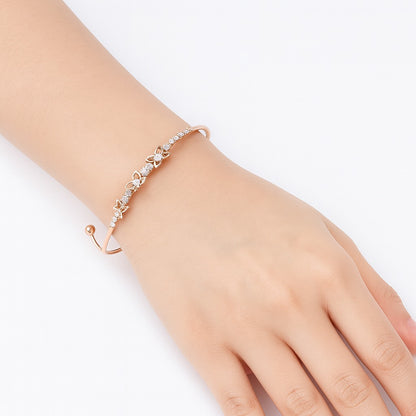 Jewello trendy rose gold plated with shimmering stone stud cuff bracelet, Kada bracelet for women and girls.
