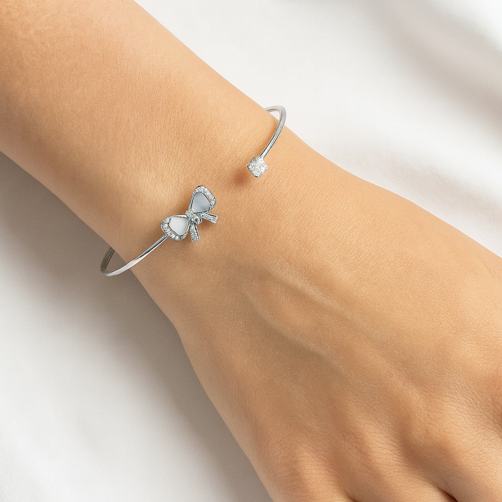 Jewello trendy silver plated with shimmering white stone stud cuff bracelet, Kada bracelet, Kada bracelet for women and girls.
